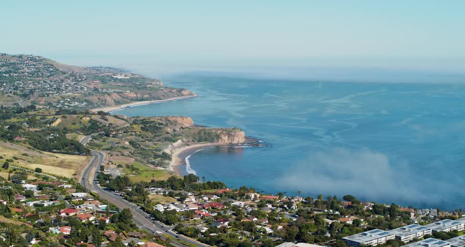 The water is blue around the town