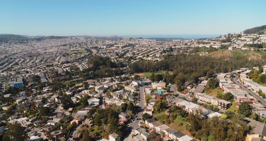 The hills are covered with buildings and homes