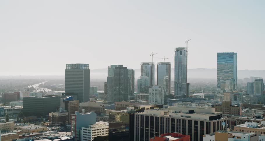 Skyscrapers and apartment buildings tightly fill a downtown city