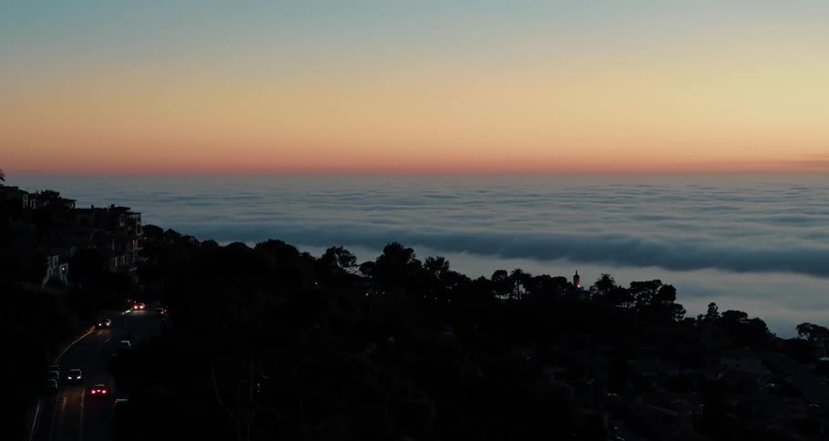 A marine layer of fog at sunset
