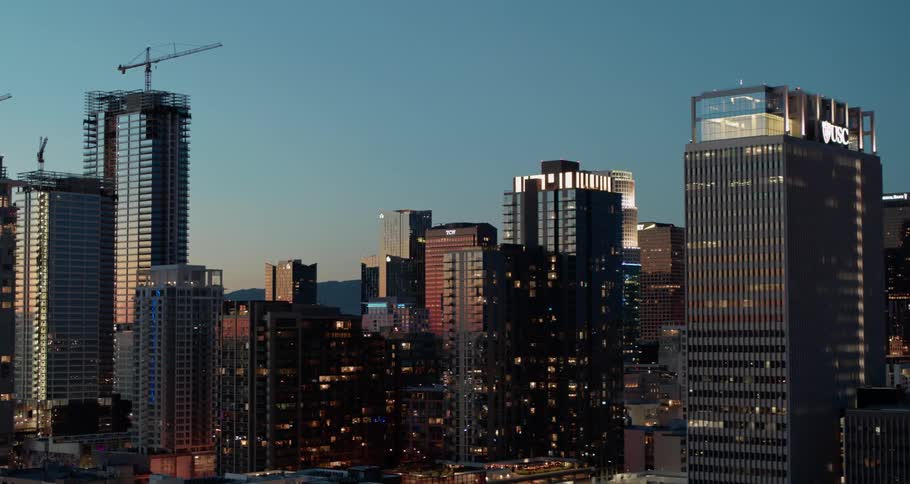 Aerial view of city skyline at sunset