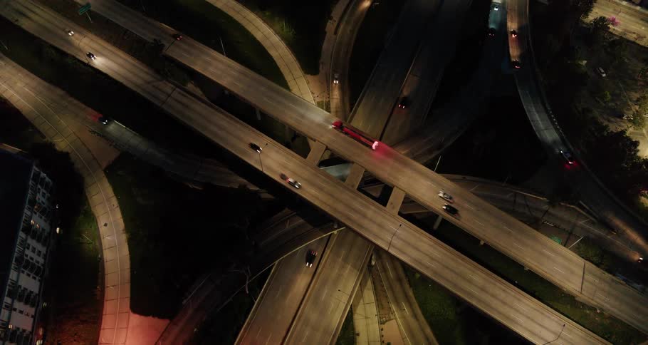 The cars travel along the freeway