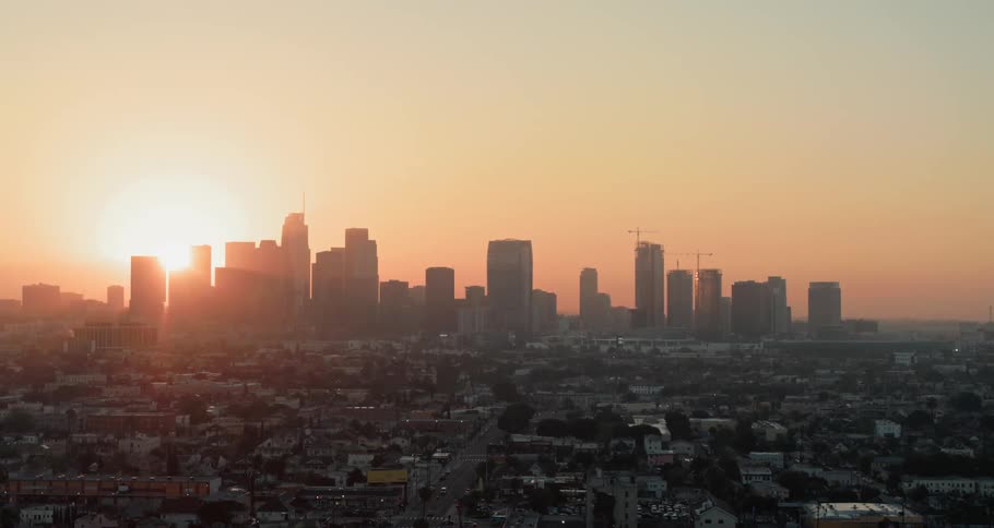 Buildings in front of a city skyline
