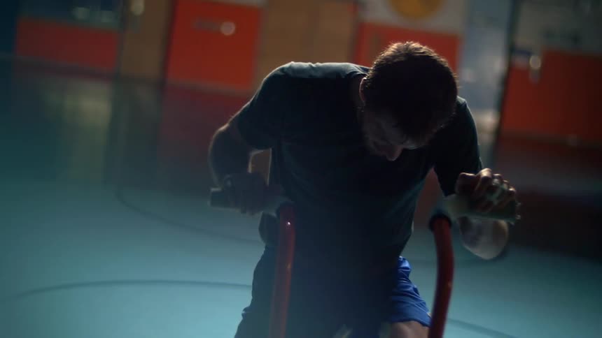 A man riding a stationary exercise bike