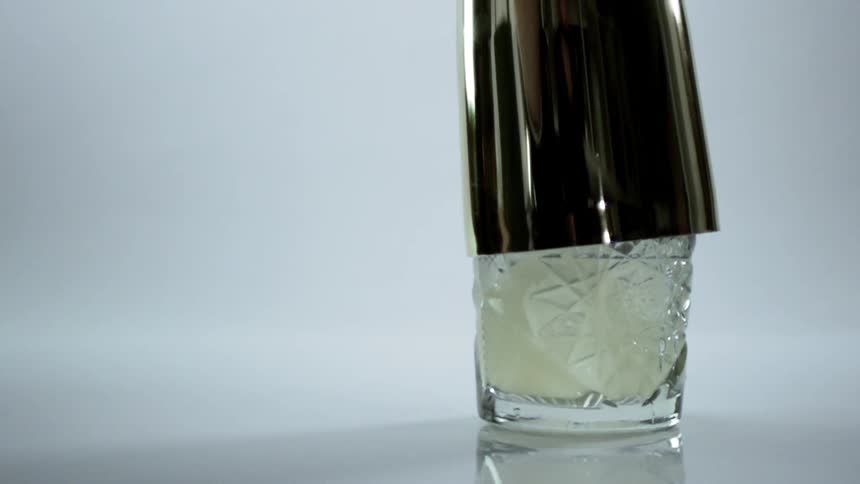 A beverage is lifted with a mixer