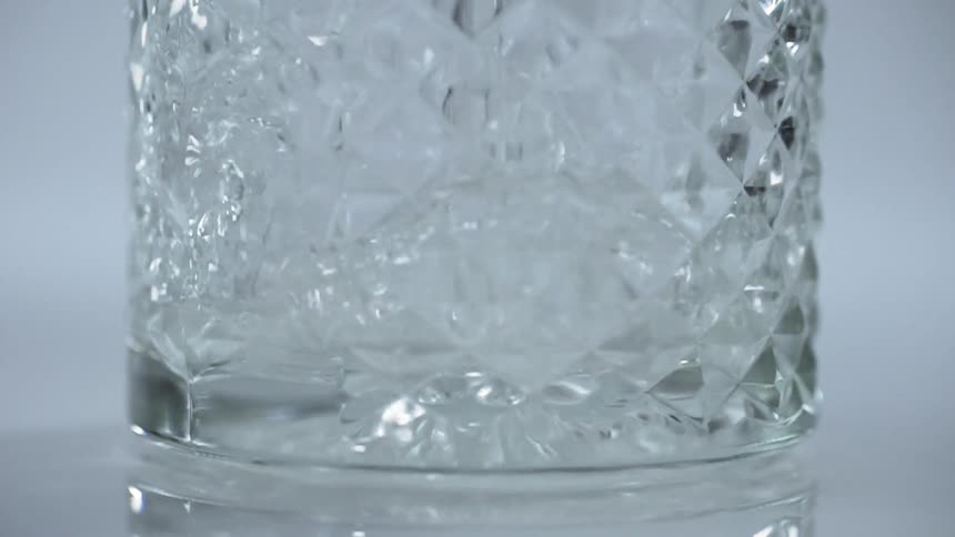 Water is being poured into a glass