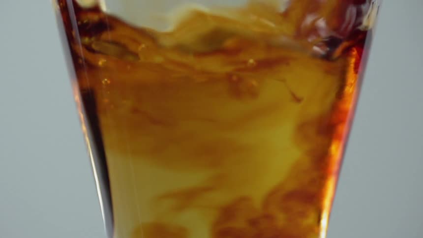The drink is poured and mixes together