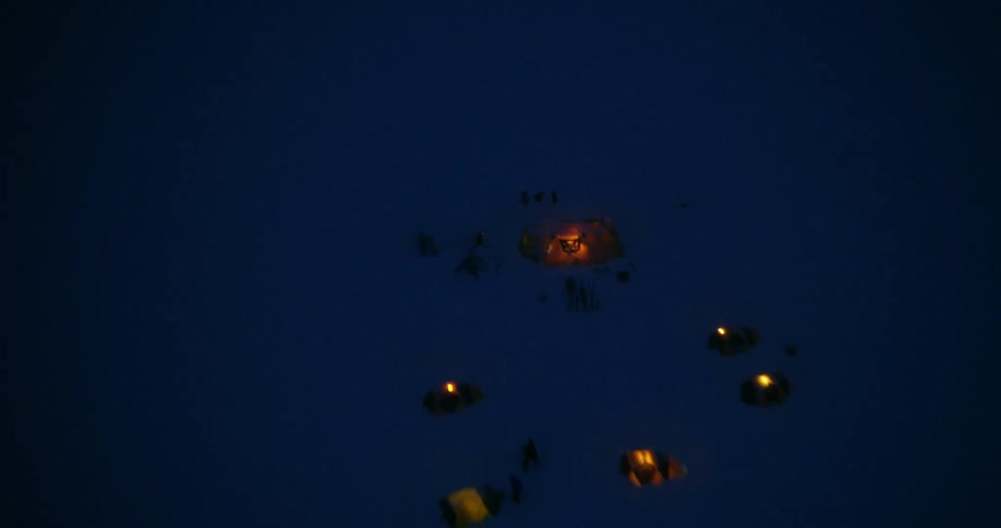 Aerial of tents at night in winter