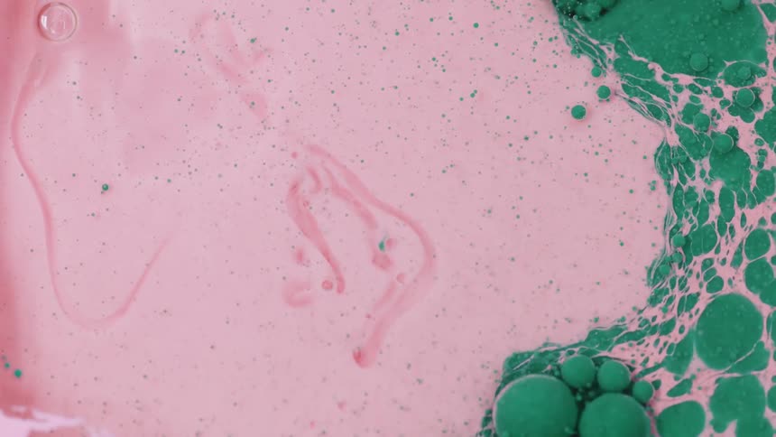 The pink liquid spreads