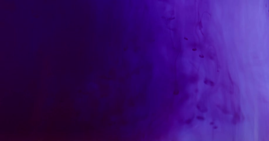Purple dye mixes with liquid