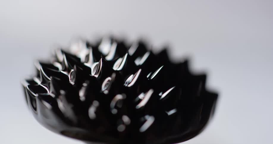 an object made out of ferro fluid that is completely fluid