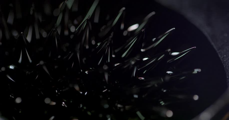 Ferro fluid forms spikes when a magnet is nearby