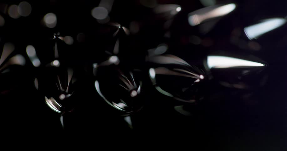White light reflects off of a black surface