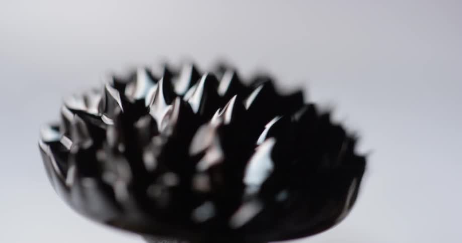 An abstract plastic object with spikes