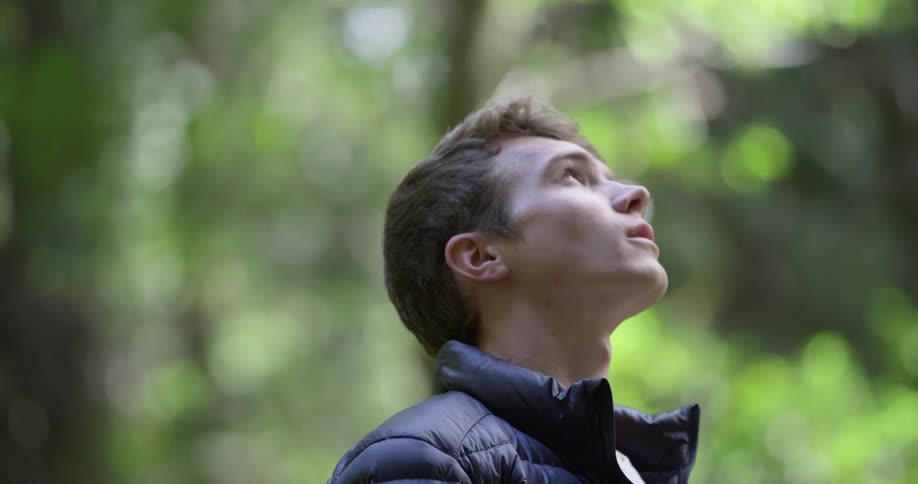 The man looked at something in the sky