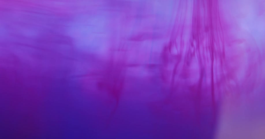 Pink liquid flows downwards
