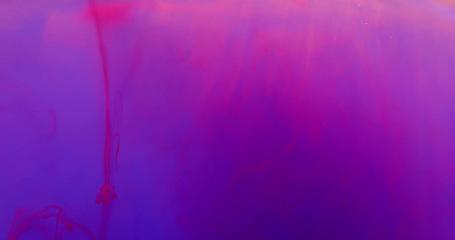 Colored liquid running down a canvas