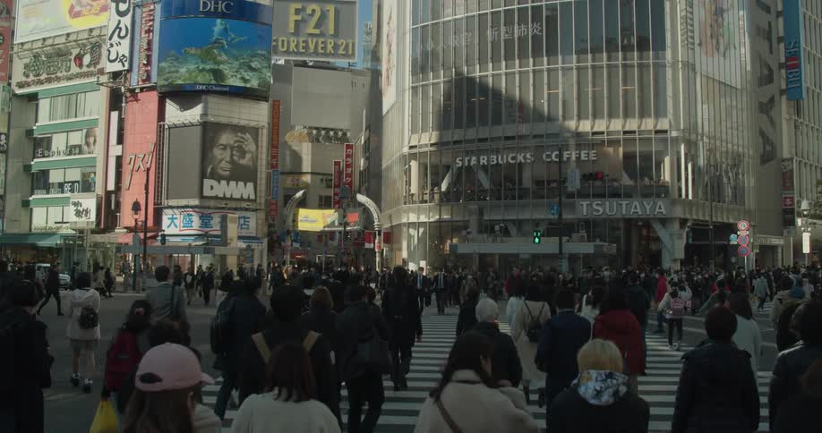 A large crowd of people at Shibuya Crossing in Tokyo