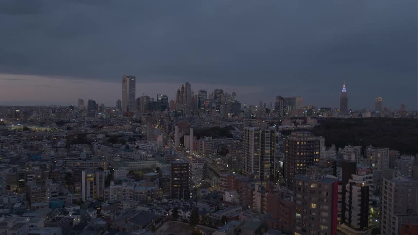 The city is lit at sunset