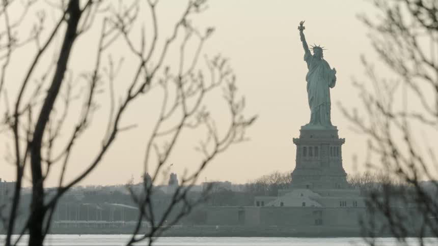The statue of liberty with the waterway in front