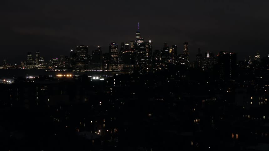 Aerial view of the illuminated city skyline at night