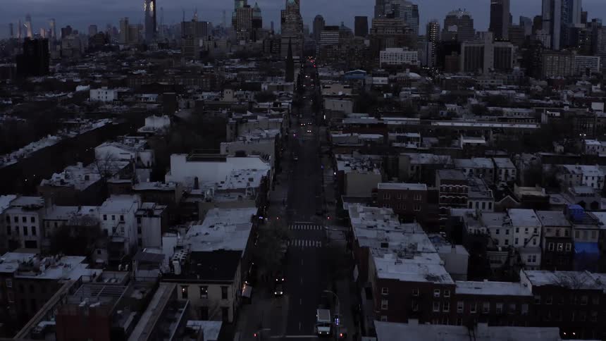 Aerial View of City Streets at Dawn