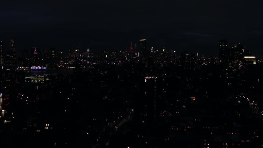 City Skyline with Bridge at Night