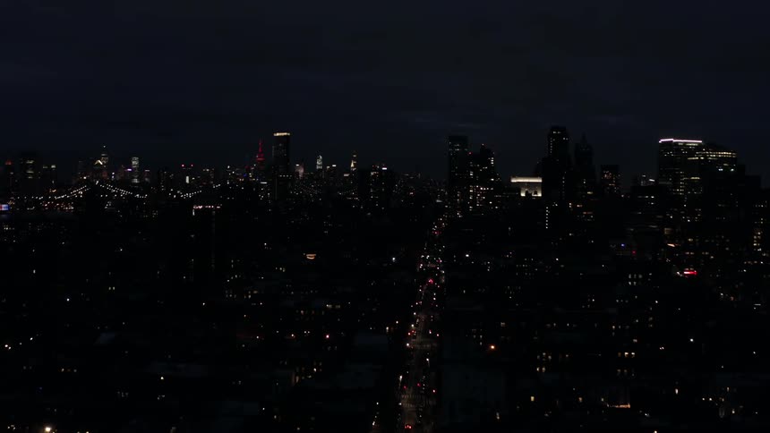 Aerial View of City Skyline at Night