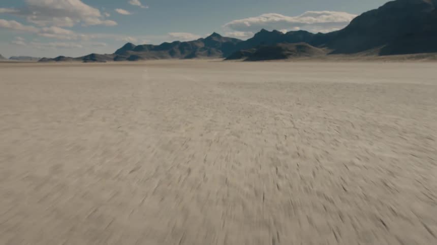 View of the arid land and mountains in the background