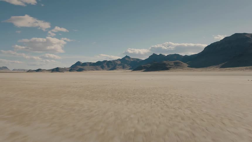 Crash soil in an arid basin near the mountains in a desert