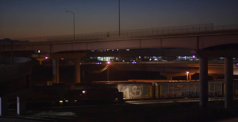 Cars and trains driving on freeways