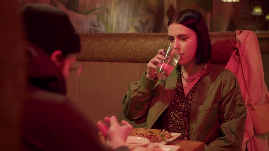The people eat and drink in the restaurant
