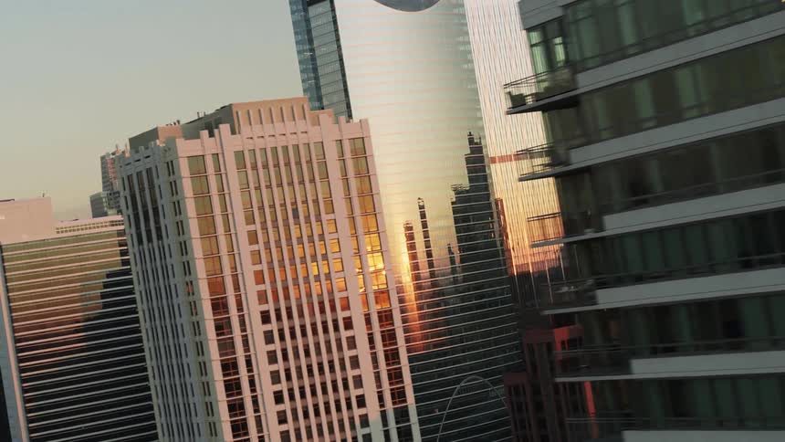 The sunrise reflected on the windows of Chicago skyscrapers