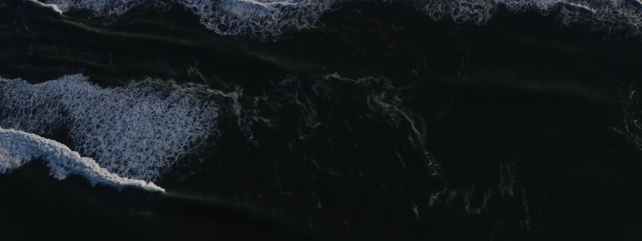 Birds eye view of waves rolling in