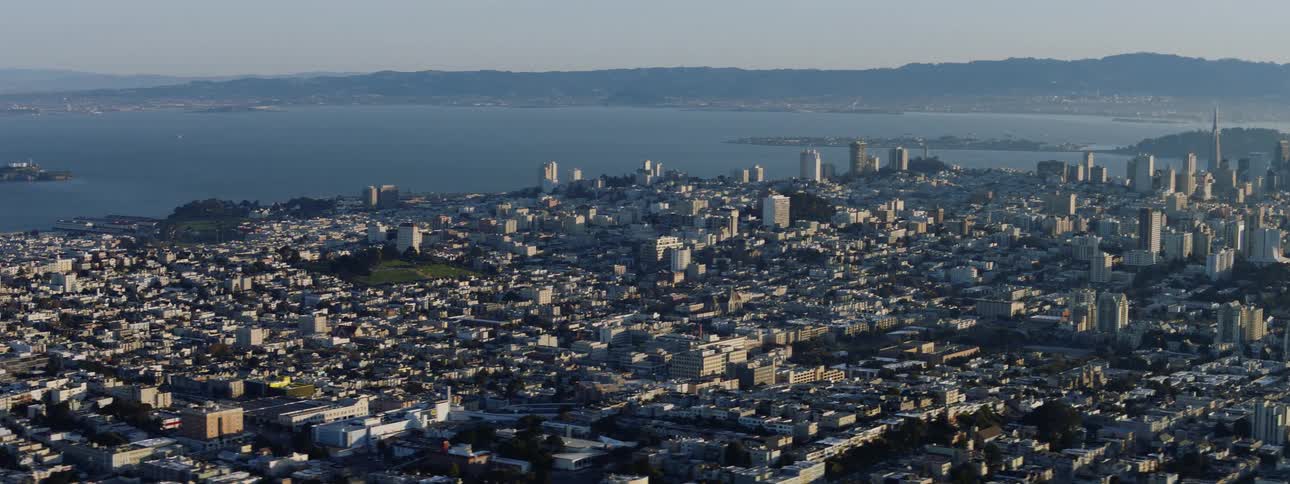 Aerial view of the city skyline next to the sea