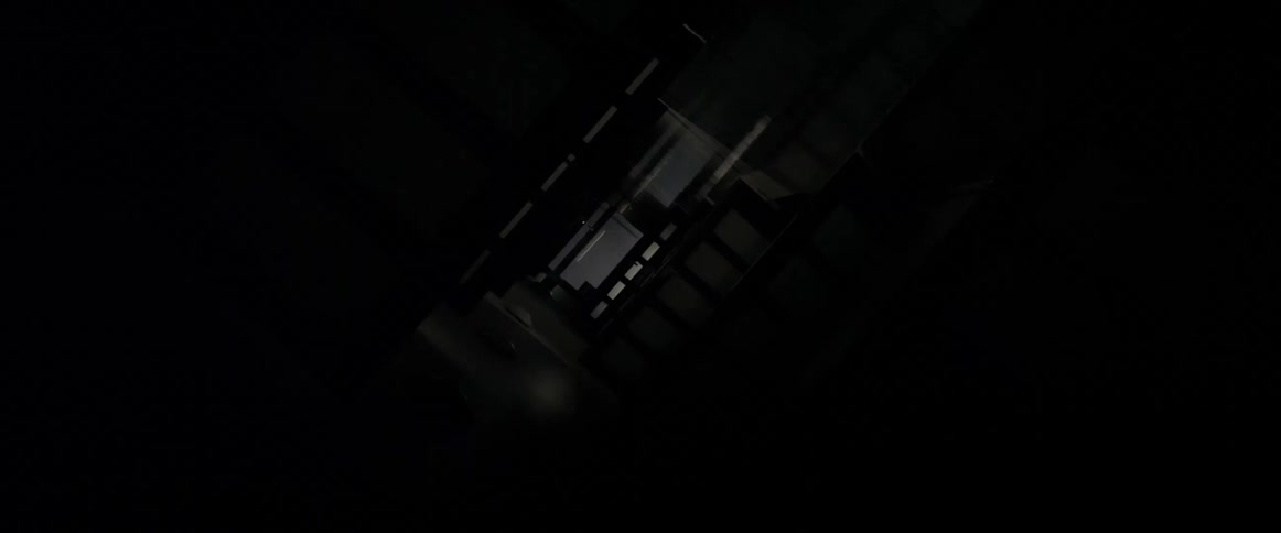 Lights flash quickly in a hallway with doors open