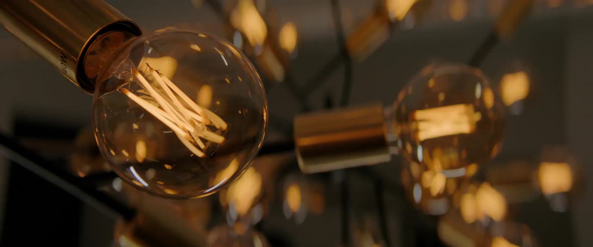 Numerous light bulbs light up at the same time