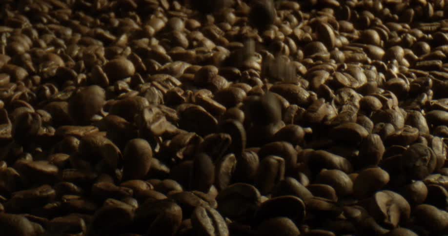 Coffee beans fall on top of each other
