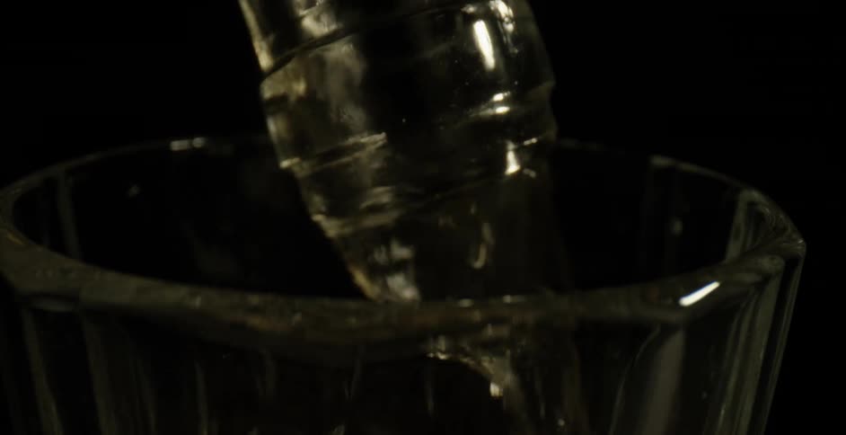Water is being poured into a glass