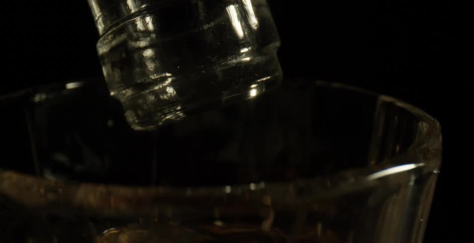 Water is being poured into a glass