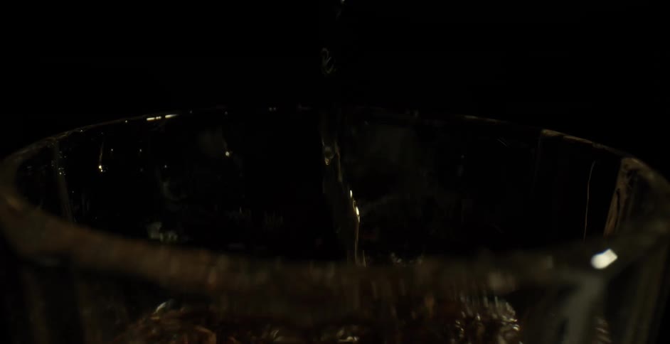 Water is being poured into a glass