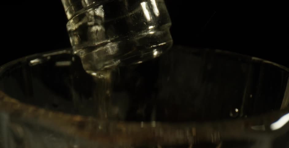 Water is being poured into a glass