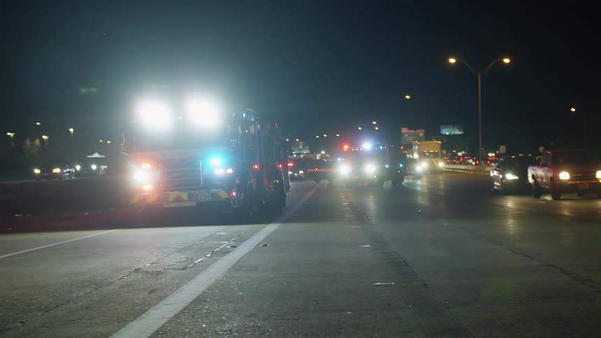 The fire trucks race into the road