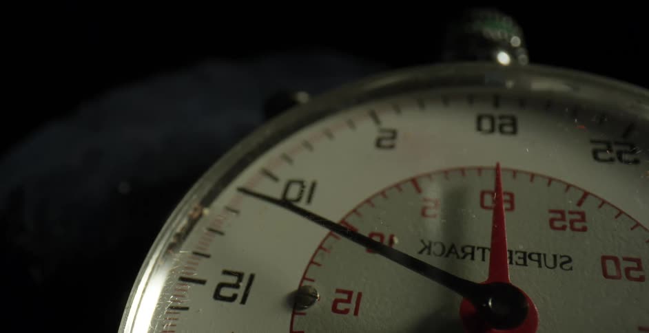 The black hand on a stopwatch ticks