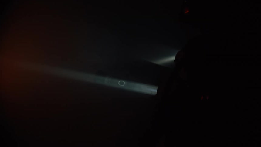 A firefighter sprays water on a fire