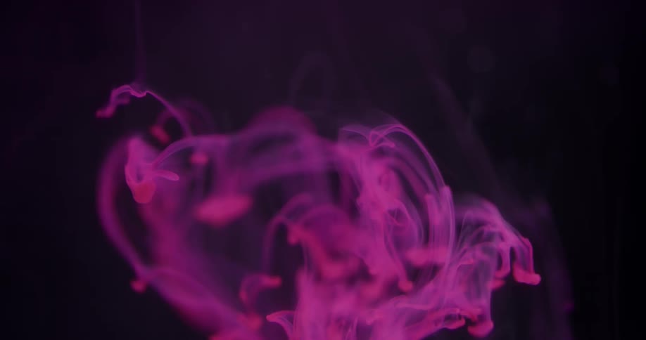 Pink dye mixing in liquid