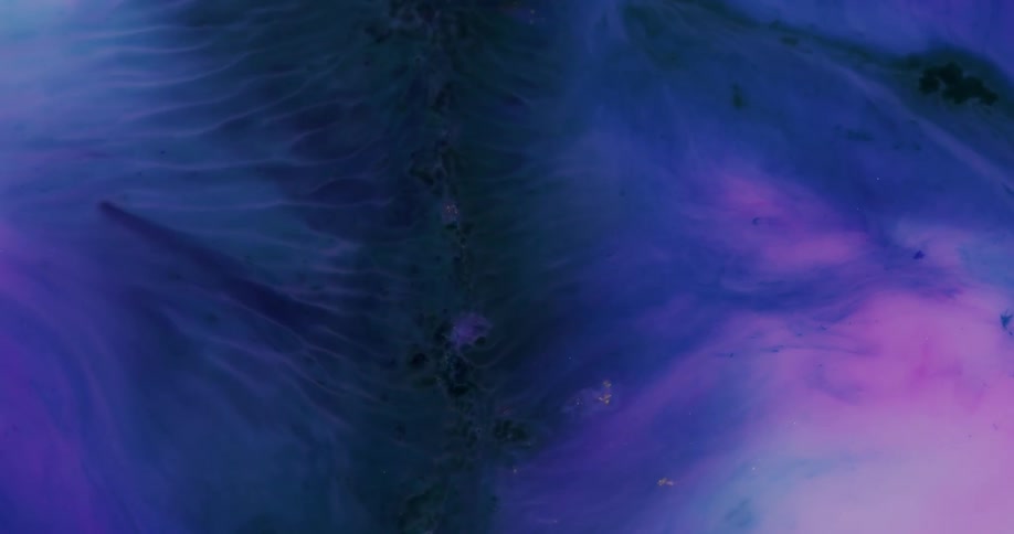 Colorful waves of ink floating on water