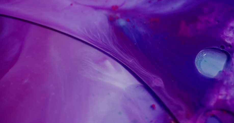 Colored liquid dyes mix together