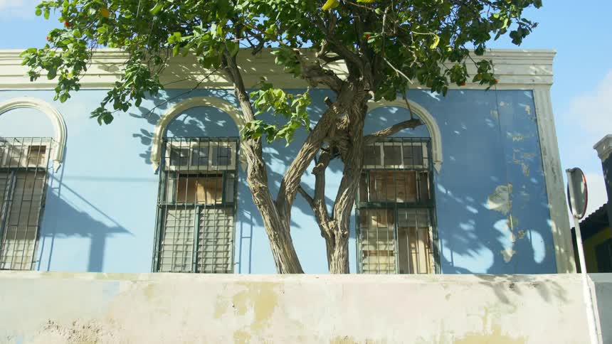 A villa painted in sky blue