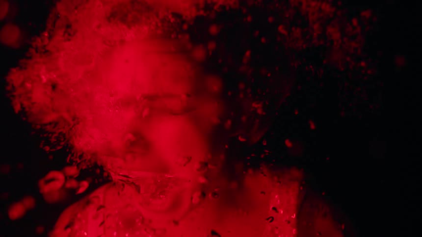 Woman suffocates and screams underwater in the red light